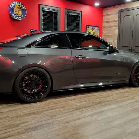 Gray Cadillac CTS on smoked oak
