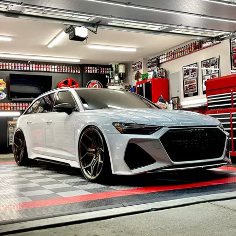 brandon burrell garage with white audi RS6