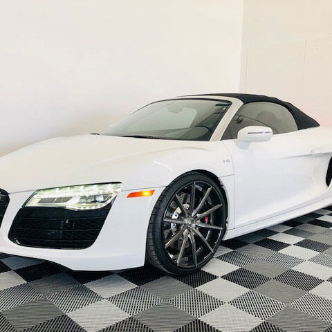 White Audi in a light Free-Flow garage