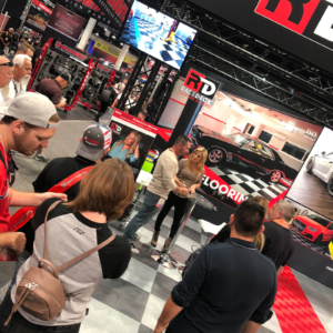 Cristy Lee signing at the RaceDeck booth