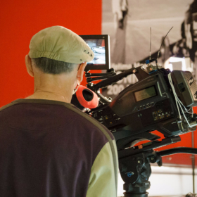 Dennis Gage filming