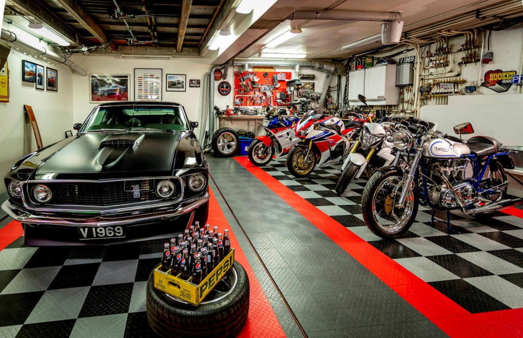 Ford Mustang and the motorcycle collection in the lower garage