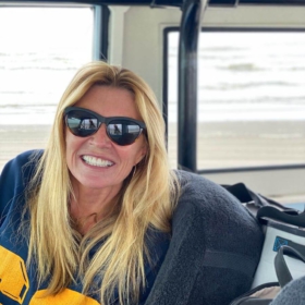 Kerry in the Bronco on the beach.