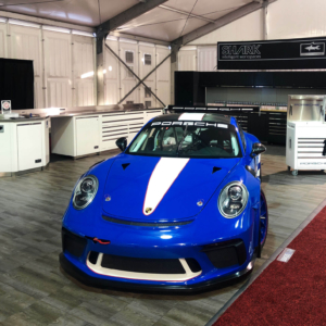 Porsche and workspace display with Smoked Oak