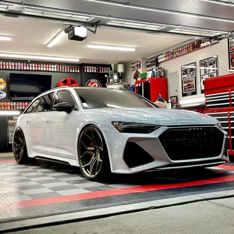 brandon burrell garage with white audi RS6