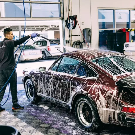 detailer washing porsche