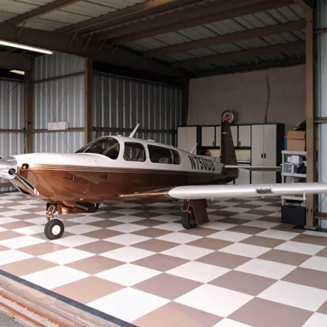 airplane hangar design brown white